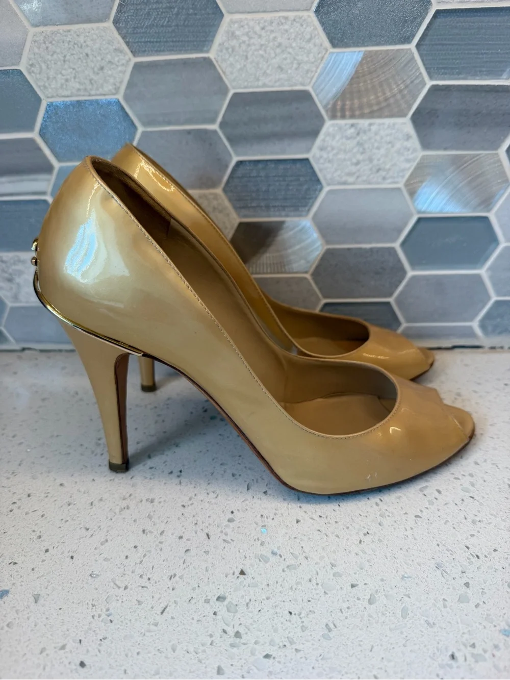 Name Your Price. CHANEL Gold Patent Leather Heels with CC Logo